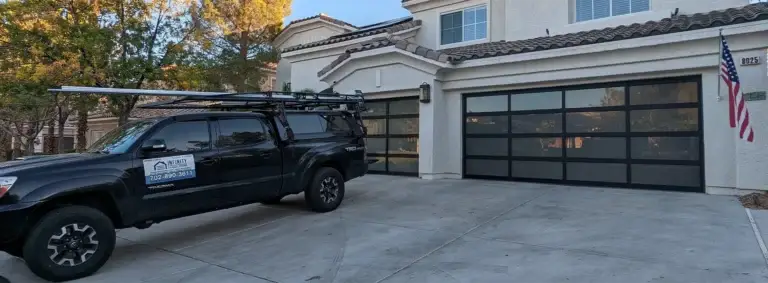 Infinity Garage Door truck near new installed glass garage door