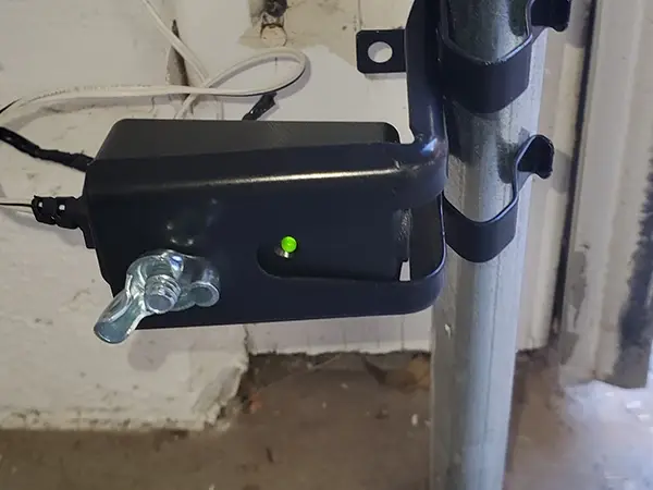 Garage door safety sensors